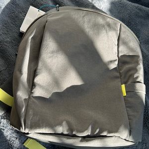 Grey and neon green coloured backpack. Tag still intact